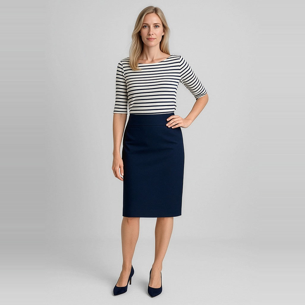 Biz Corporates Comfort Wool Stretch Womens Relaxed Fit Lined Skirt 24011 in Navy, worn by model