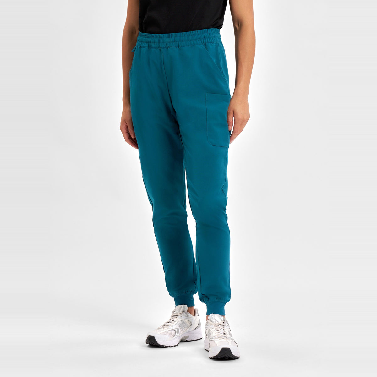 Inaura Pulse Womens Jogger Scrub Pant CL541LL in Caribbean Blue, worn by model, view 2