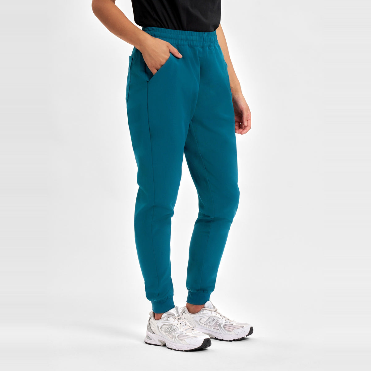 Inaura Pulse Womens Jogger Scrub Pant CL541LL in Caribbean Blue, worn by model, view 3