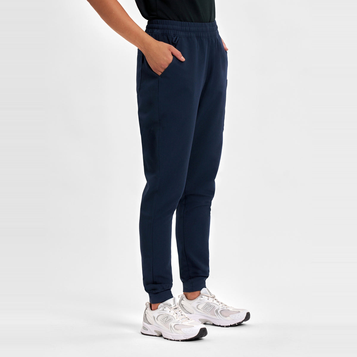 Inaura Pulse Womens Jogger Scrub Pant CL541LL in Midnight Navy, worn by model, view 3