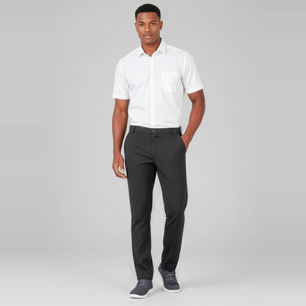 Biz Comfort Waist Mens Flat Front Pant CL958ML in Charcoal, worn by model