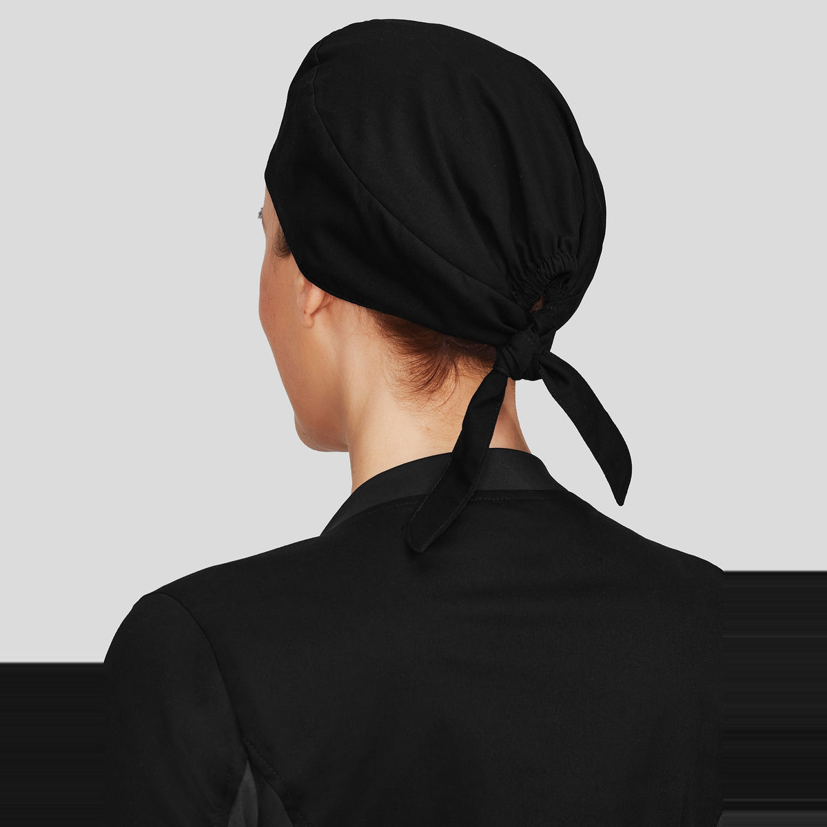 Inaura Reversible Unisex Scrub Cap CSC249U in Black, worn by model, view 4