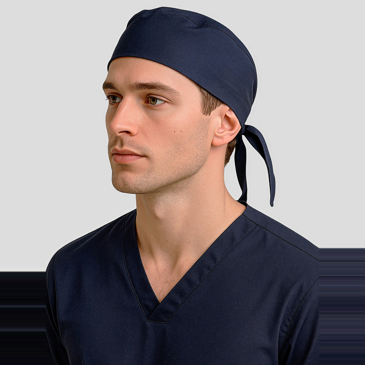 Inaura Reversible Unisex Scrub Cap CSC249U in Midnight Navy, worn by model