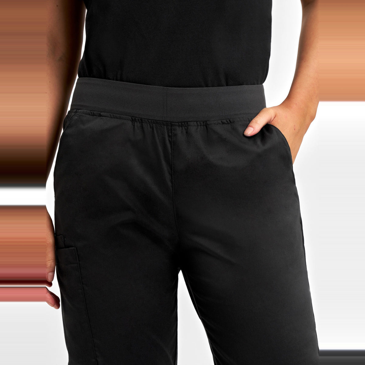 Inaura Riley Womens Slim Leg Jogger Scrub Pant CSP042LL in Black, worn by model, view 5