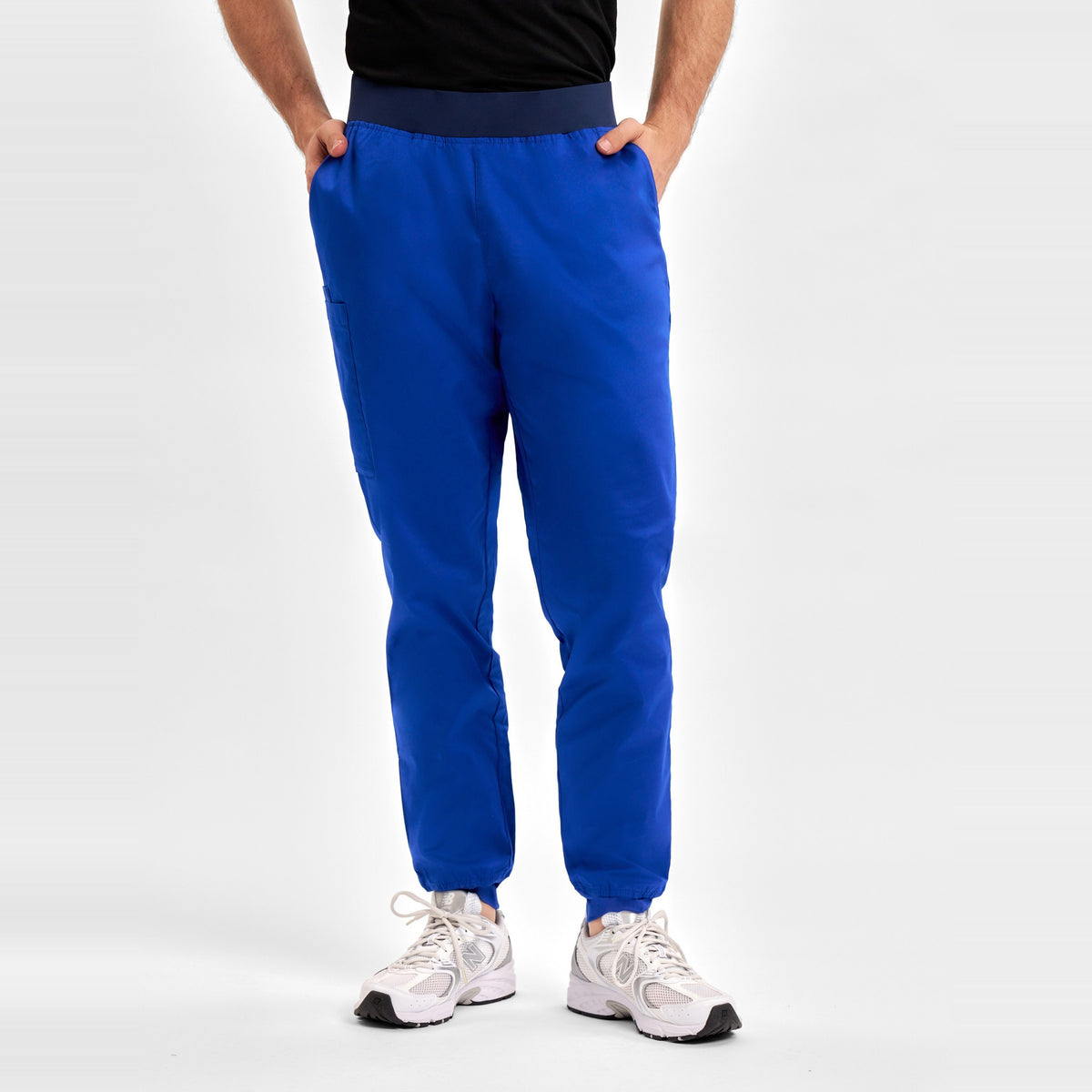 Inaura Riley Mens Slim Leg Jogger Scrub Pant CSP042ML in Electric Blue, worn by model, view 2