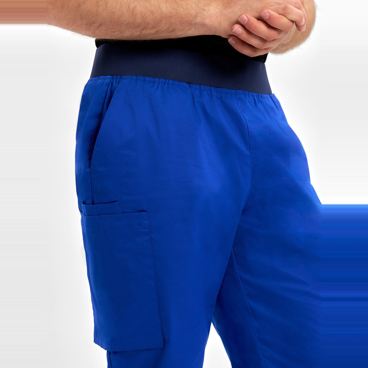 Inaura Riley Mens Slim Leg Jogger Scrub Pant CSP042ML in Electric Blue, worn by model, view 5