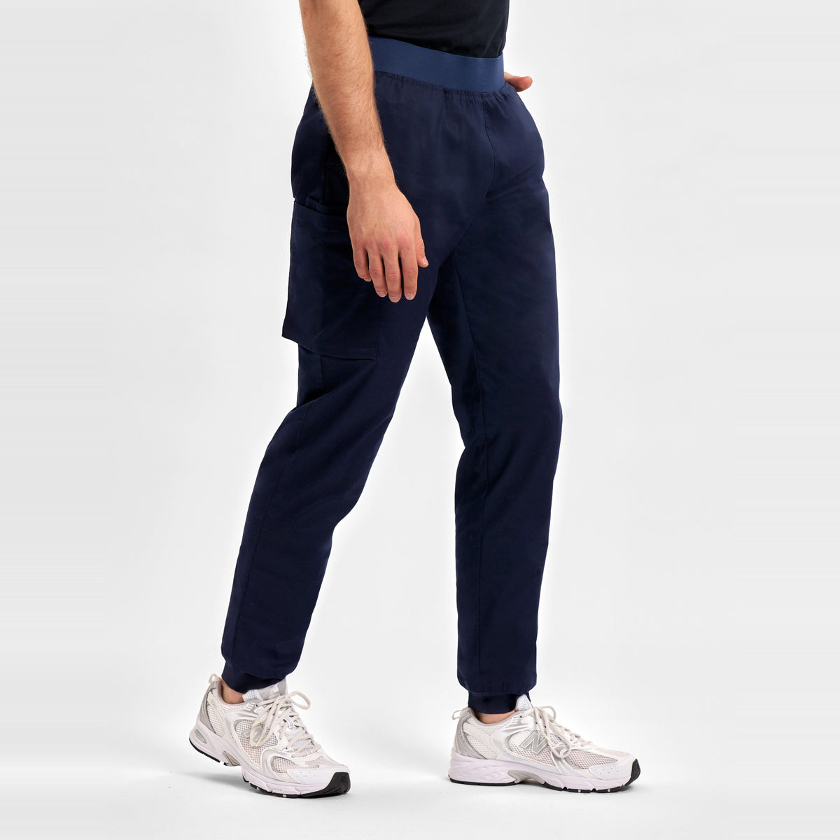 Inaura Riley Mens Slim Leg Jogger Scrub Pant CSP042ML in Midnight Navy, worn by model, view 3
