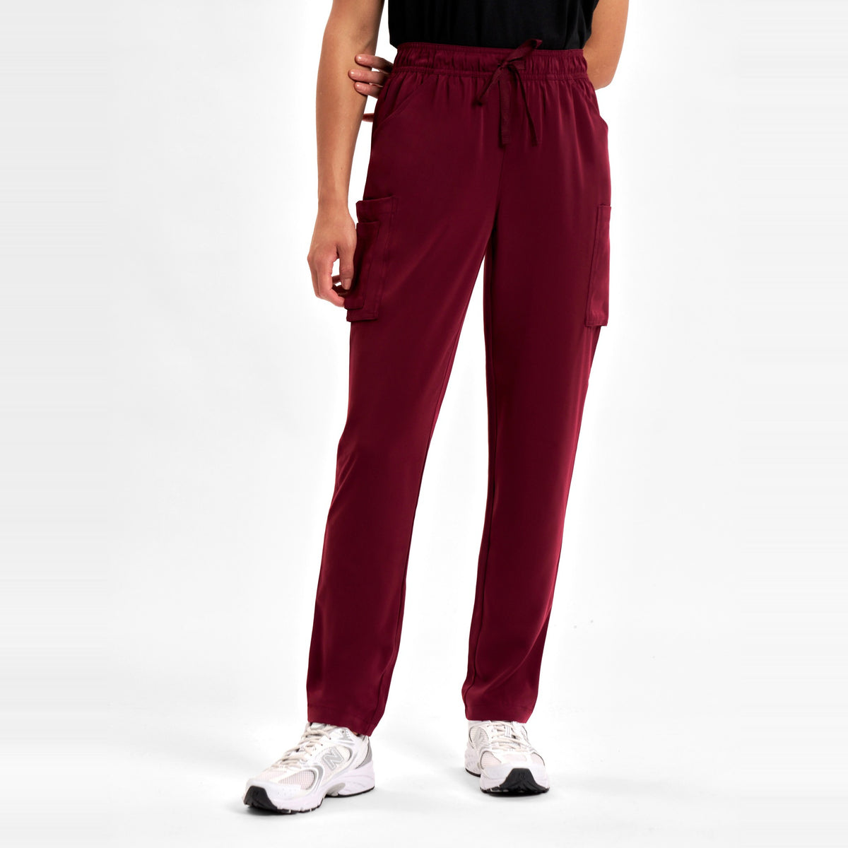 Inaura Avery Womens Slim Leg Scrub Pant CSP943LL in Burgundy, worn by model, view 2