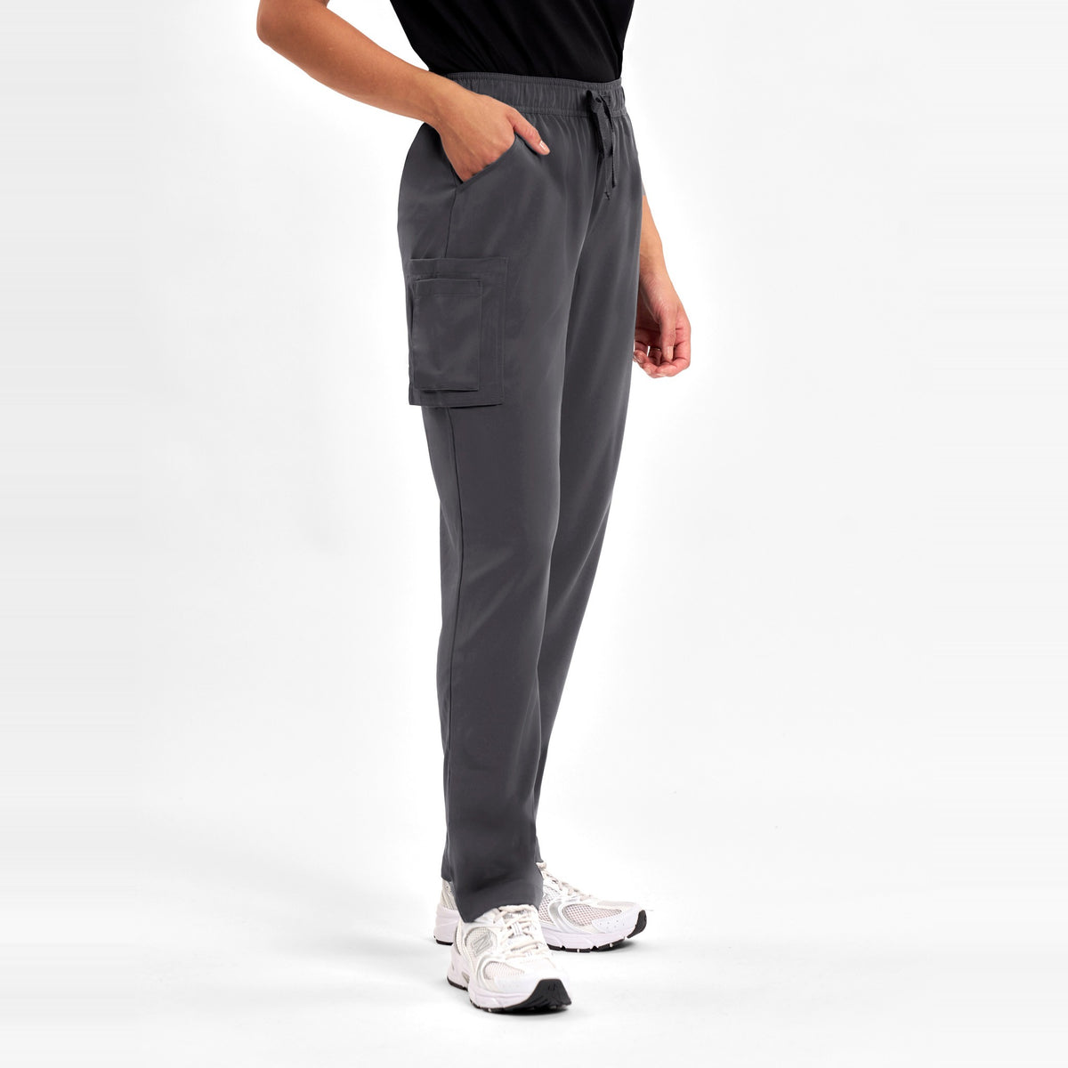Inaura Avery Womens Slim Leg Scrub Pant CSP943LL in Charcoal, worn by model, view 3