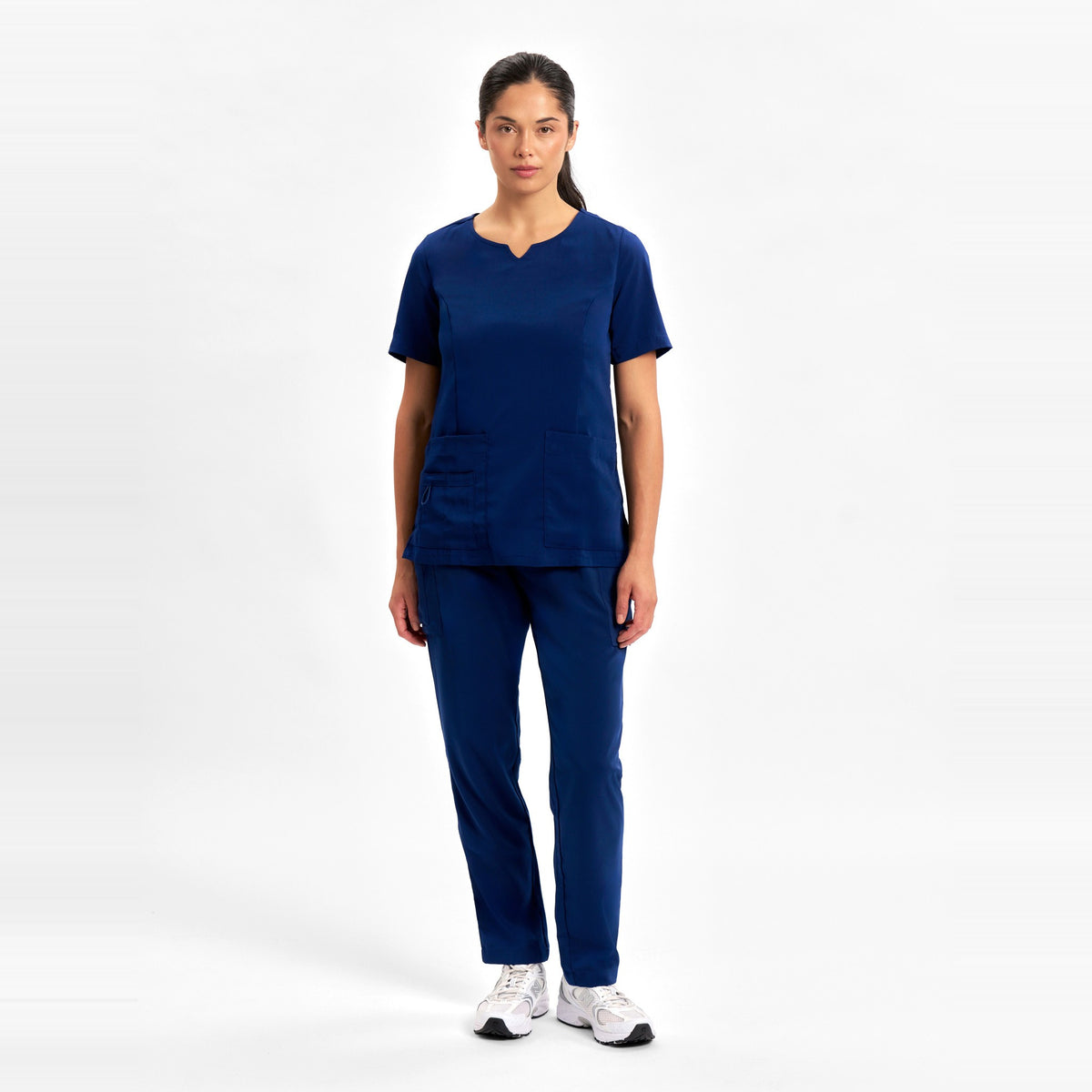 Inaura Avery Womens Slim Leg Scrub Pant CSP943LL in Navy, worn by model