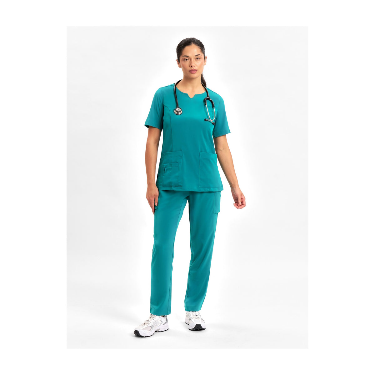 Inaura Avery Womens Slim Leg Scrub Pant CSP943LL in Teal, worn by model