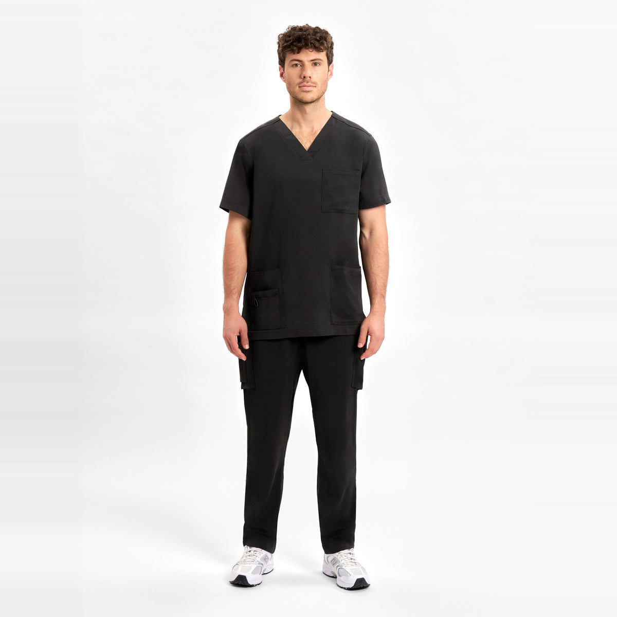 Inaura Avery Mens Straight Leg Scrub Pant CSP946ML in Black, worn by model