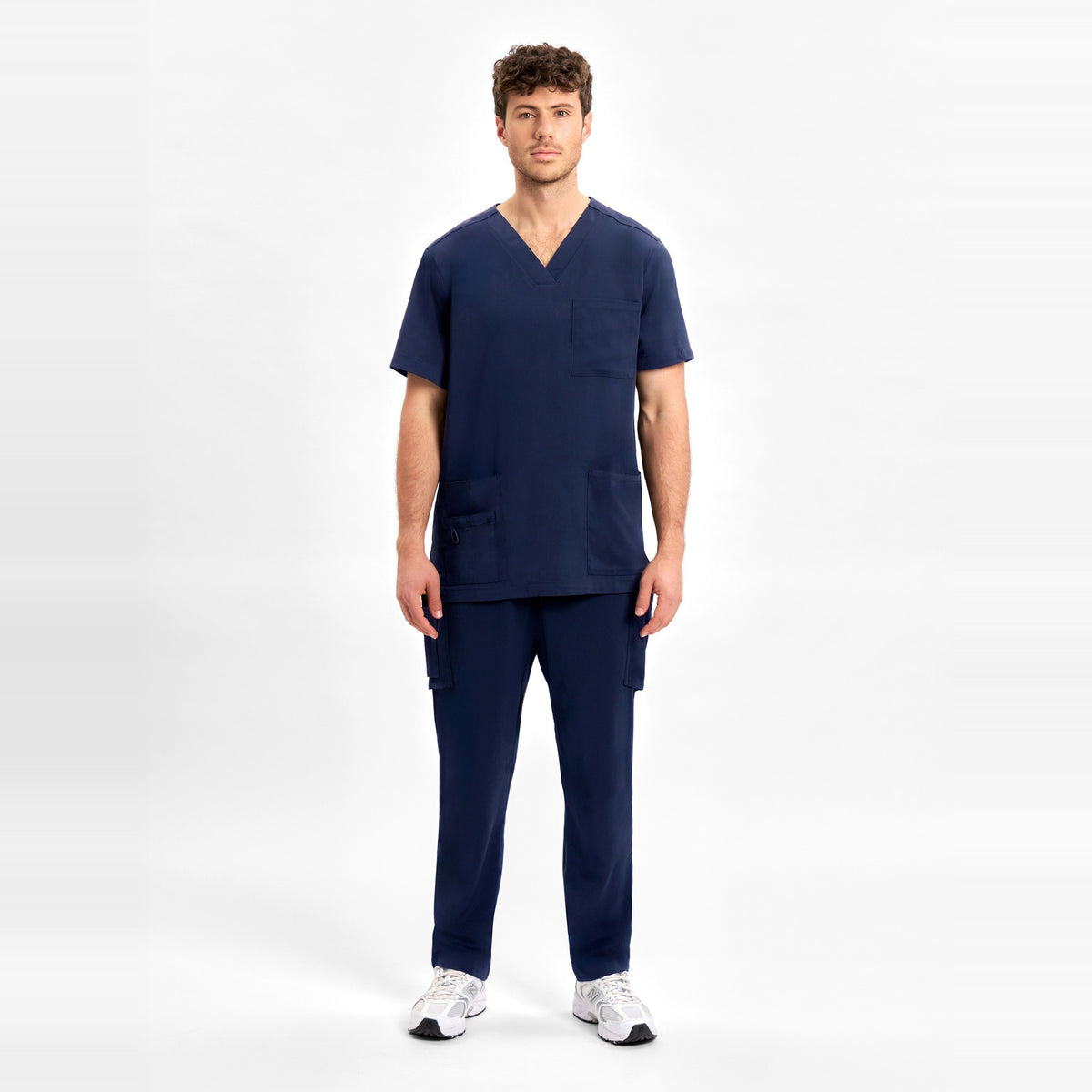 Inaura Avery Mens Straight Leg Scrub Pant CSP946ML in Midnight Navy, worn by model