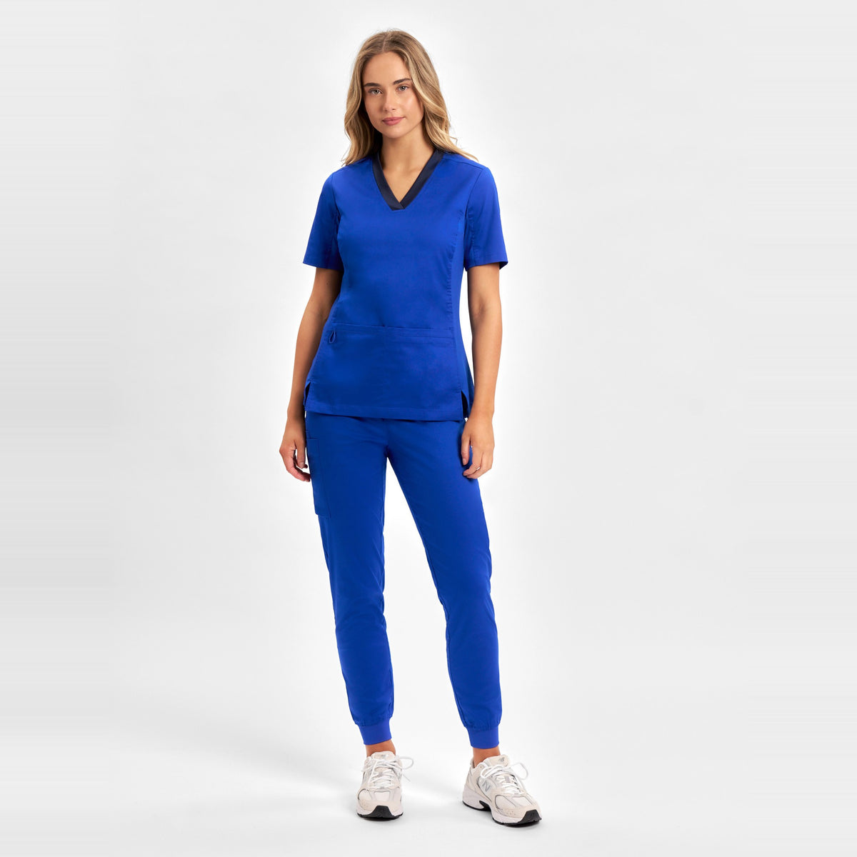 Inaura Riley Womens Stretch Scrub Top CST043LS in Electric Blue, worn by model, view 2