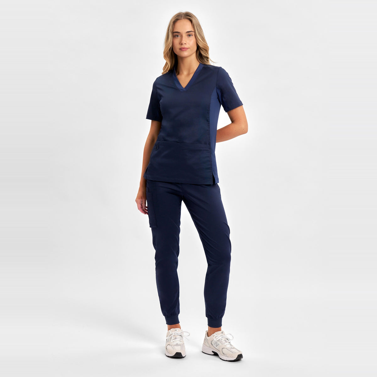 Inaura Riley Womens Stretch Scrub Top CST043LS in Midnight Navy, worn by model, view 2