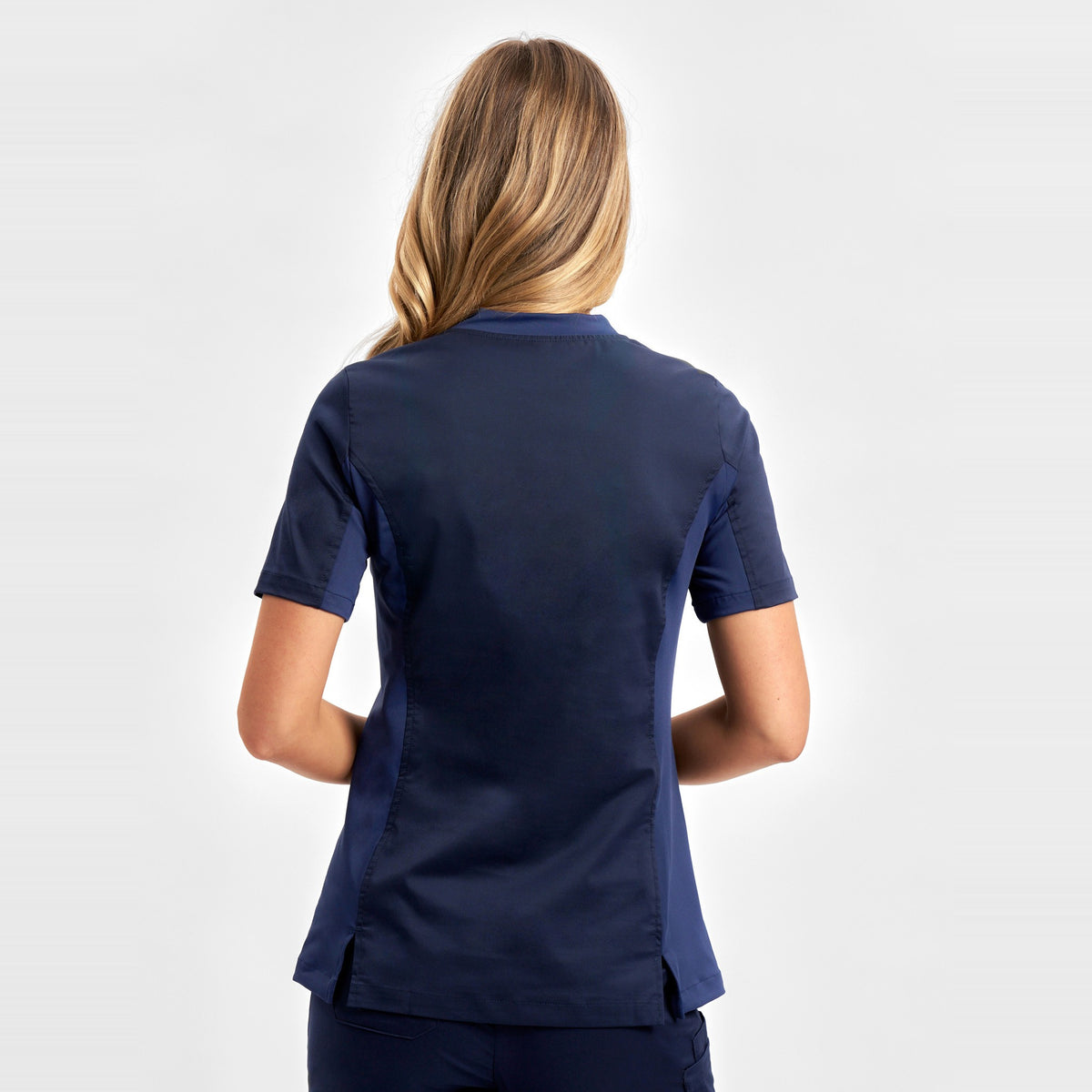 Inaura Riley Womens Stretch Scrub Top CST043LS in Midnight Navy, worn by model, view 4