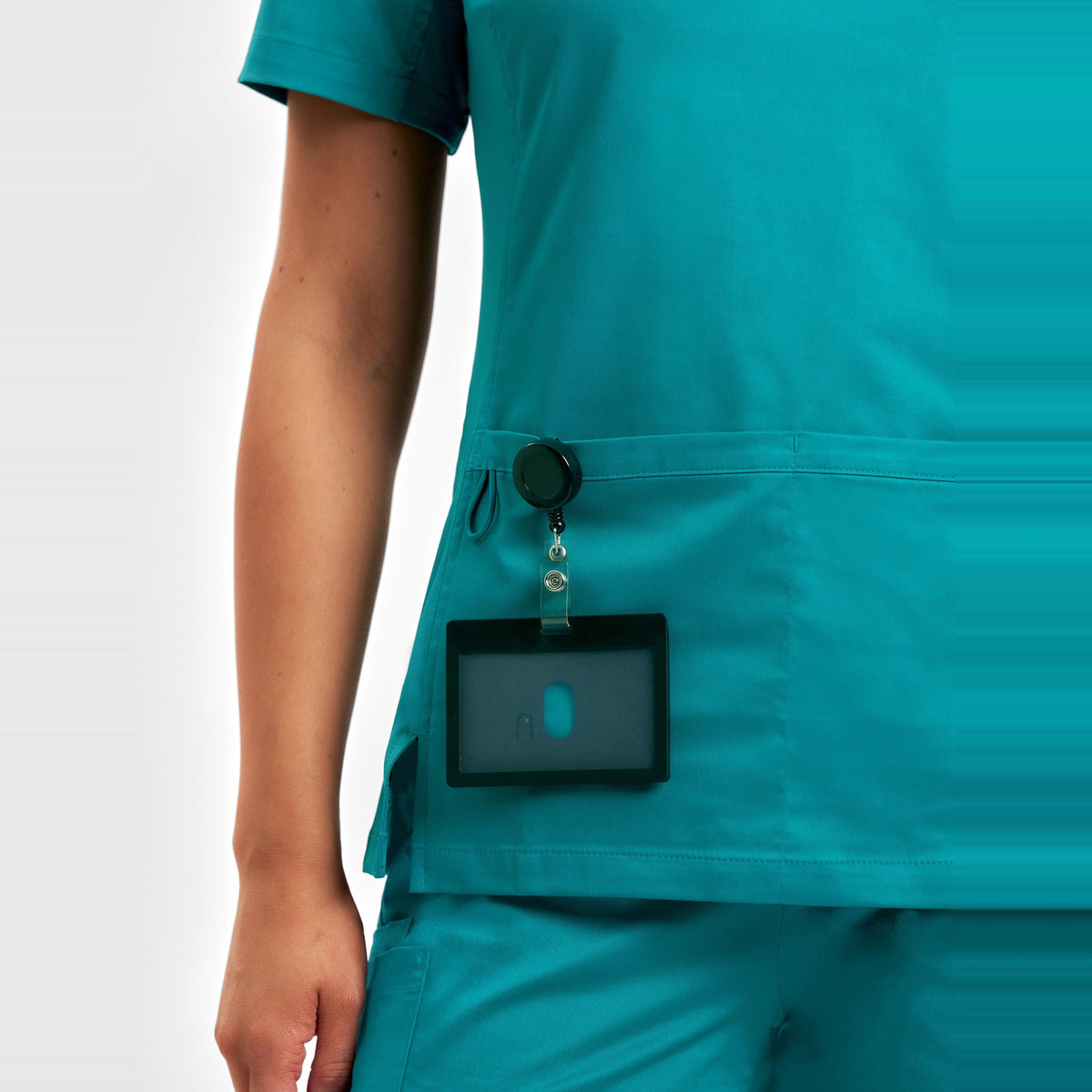Inaura Riley Womens Stretch Scrub Top CST043LS in Teal, worn by model, view 5