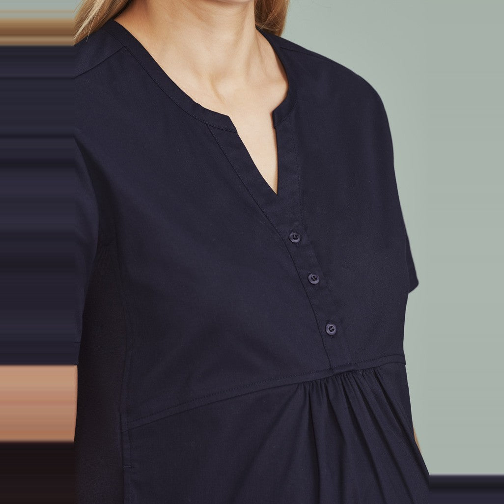 Inaura Rose Womens Tunic Scrub Top CST243LS in Midnight Navy, worn by model, view 2