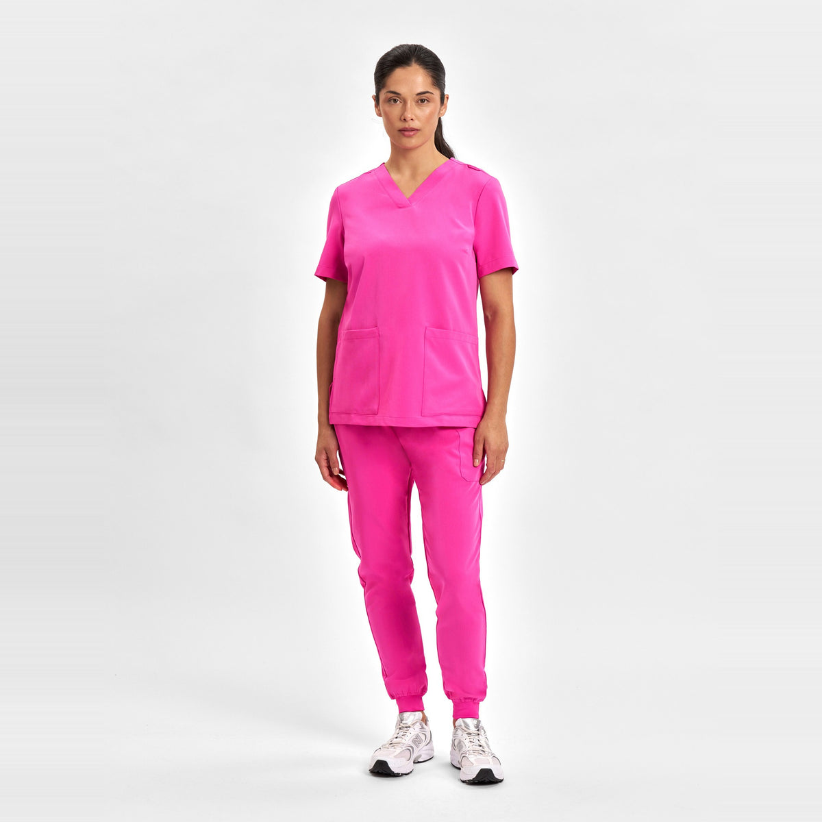 Inaura Pink Womens V-Neck Scrub Top CST245LS in Pink, worn by model, view 2