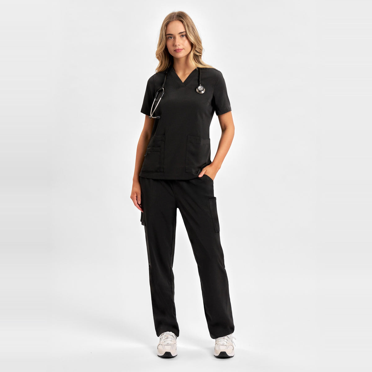 Inaura Avery Womens V-Neck Scrub Top CST941LS in Black, worn by model, view 2