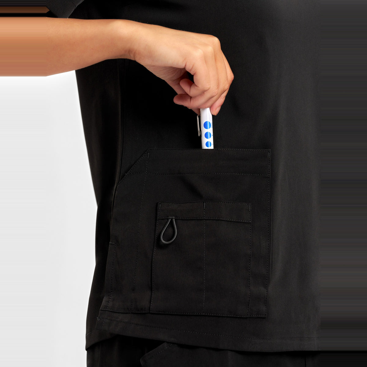 Inaura Avery Womens V-Neck Scrub Top CST941LS in Black, worn by model, view 5