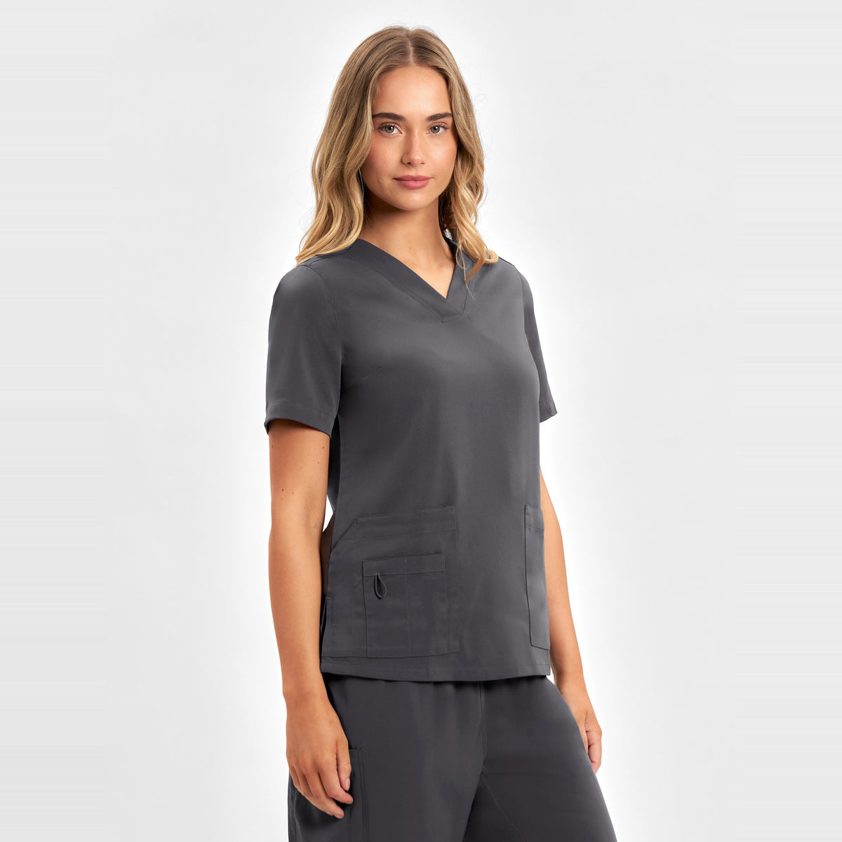 Inaura Avery Womens V-Neck Scrub Top CST941LS in Charcoal, worn by model, view 3
