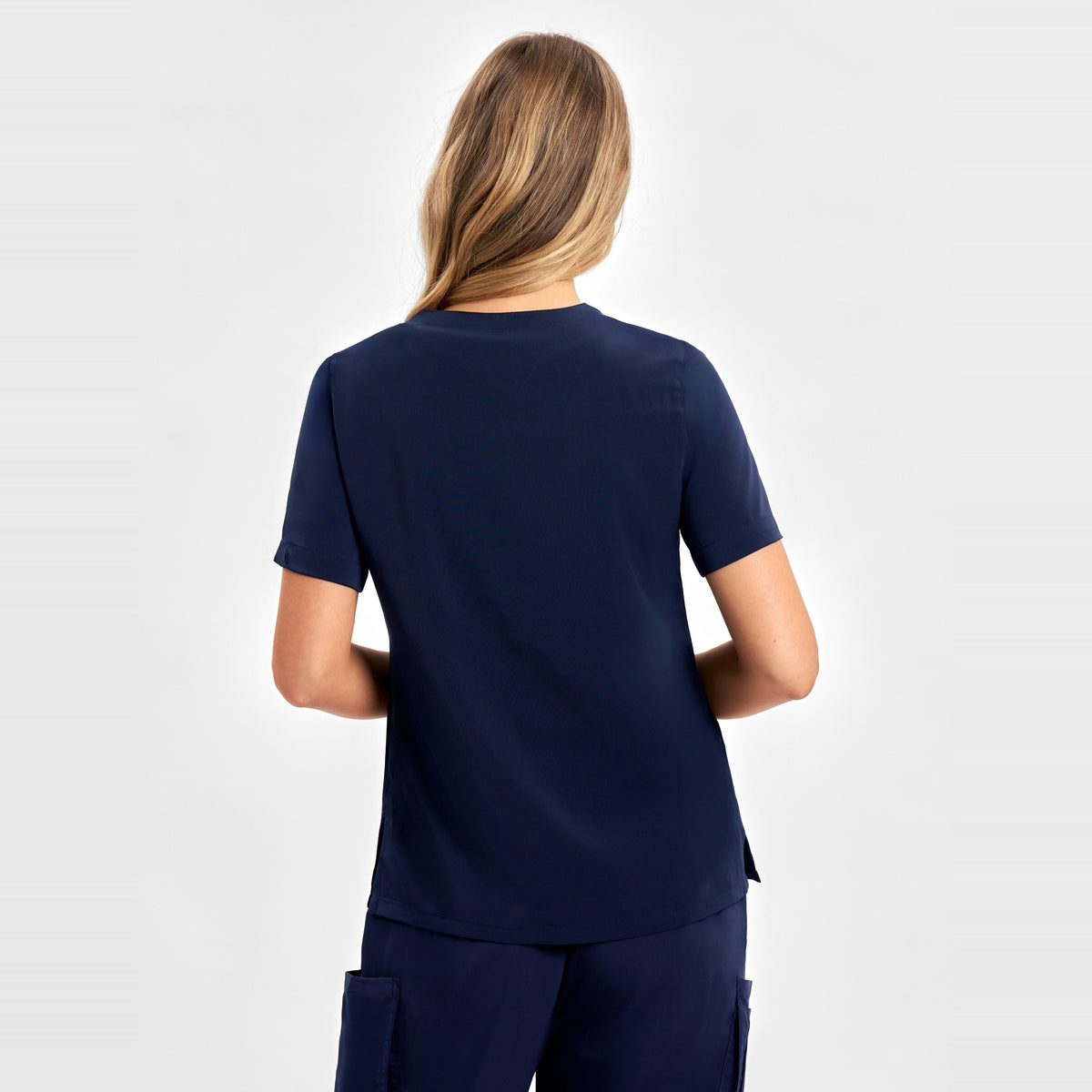 Inaura Avery Womens V-Neck Scrub Top CST941LS in Midnight Navy, worn by model, view 4