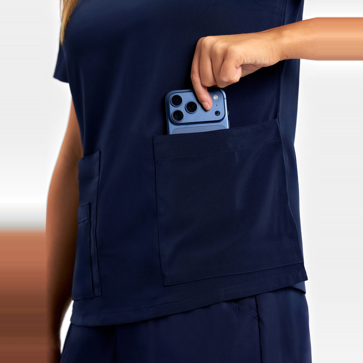 Inaura Avery Womens V-Neck Scrub Top CST941LS in Midnight Navy, worn by model, view 5