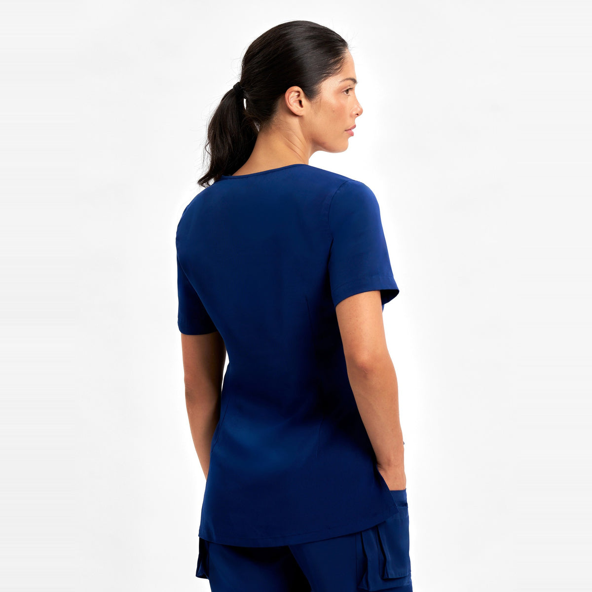 Inaura Avery Womens Round Neck Scrub Top CST942LS in Navy, worn by model, view 4
