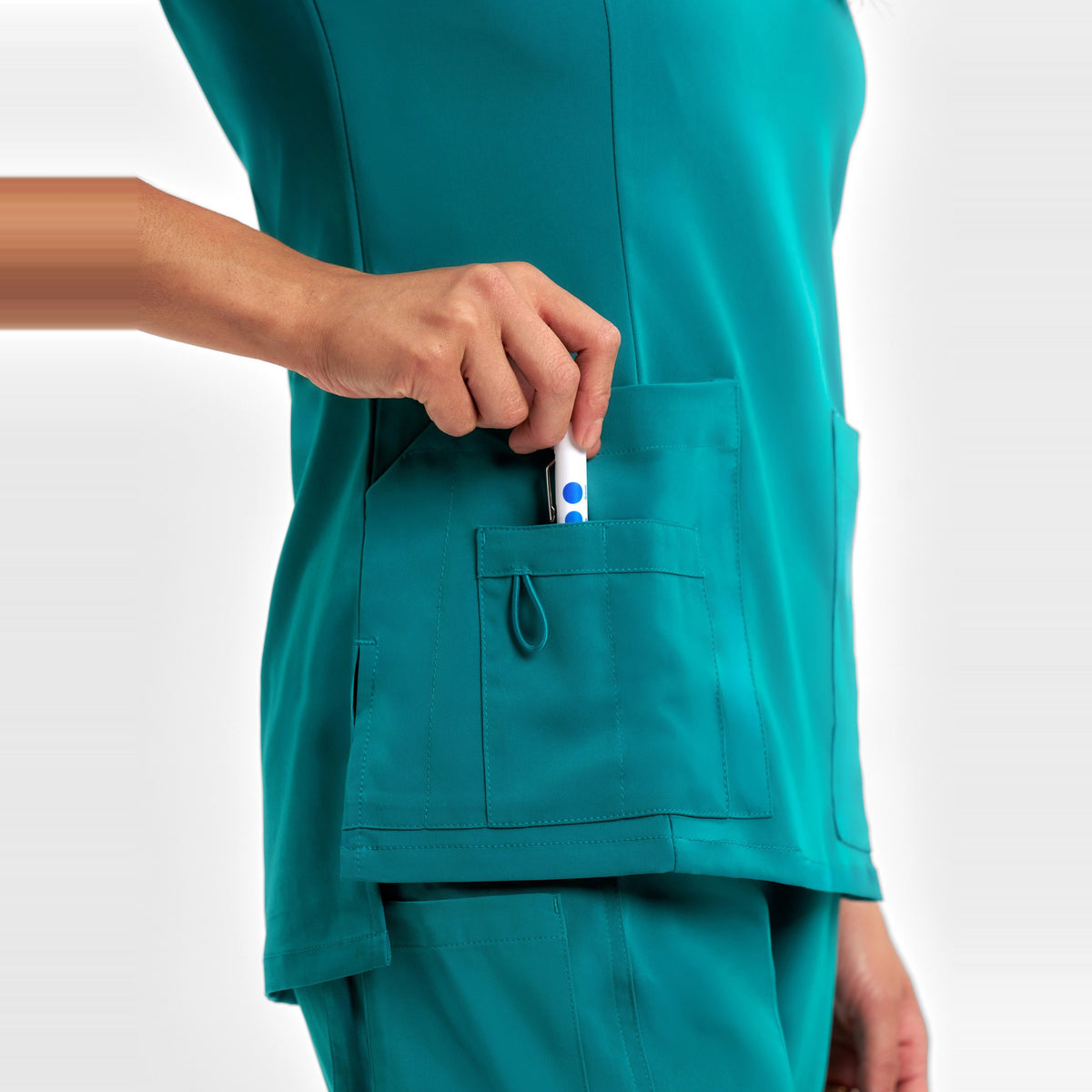 Inaura Avery Womens Round Neck Scrub Top CST942LS in Teal, worn by model, view 5