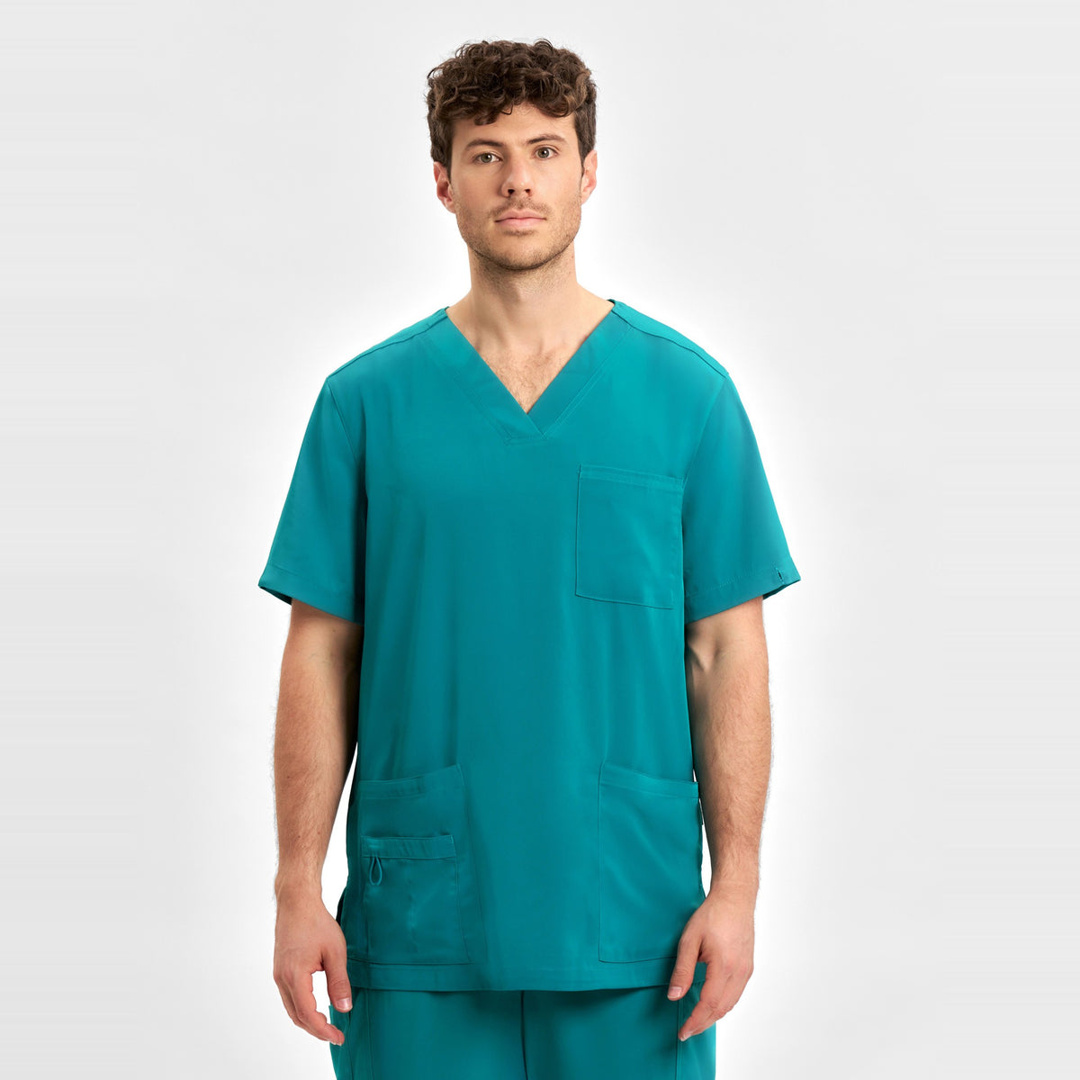 Inaura Avery Mens V-Neck Scrub Top CST945MS in Teal, worn by model