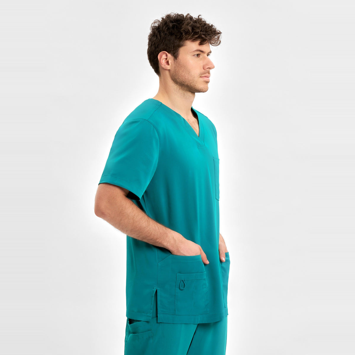Inaura Avery Mens V-Neck Scrub Top CST945MS in Teal, worn by model, view 3