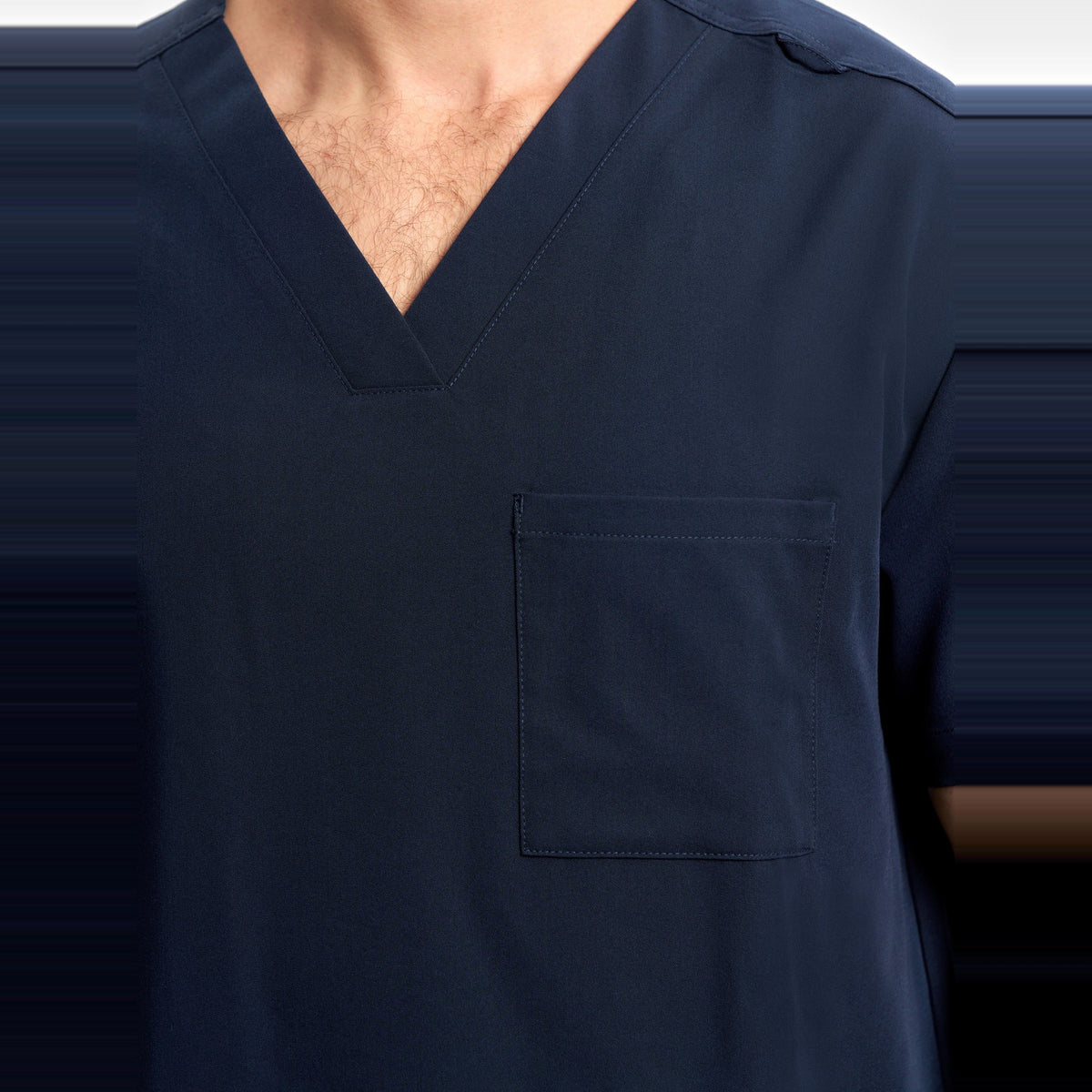 Inaura Pulse Unisex V-Neck Scrub Top CU544US in Midnight Navy, worn by model, view 6