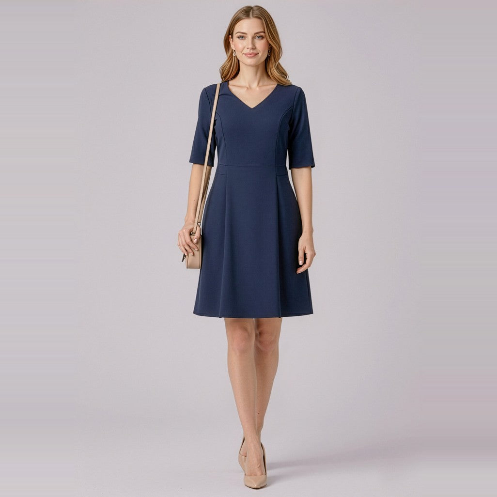 Biz Corporates Siena Womens Extended Short Sleeve Dress RD974L in Marine, worn by model