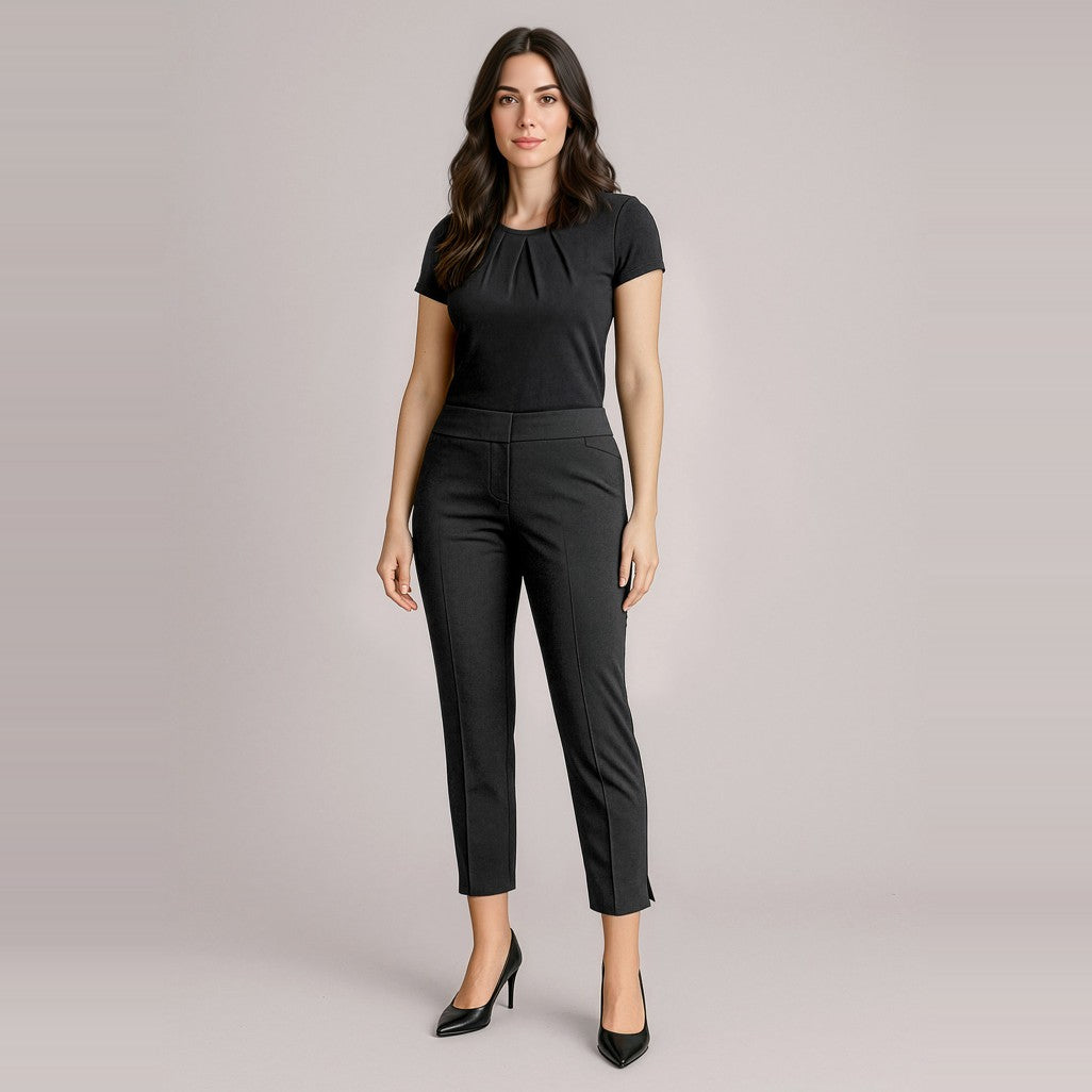 Biz Corporates Siena Womens 7/8 Mid-waist Slim Leg Pant RGP308L in Black, worn by model