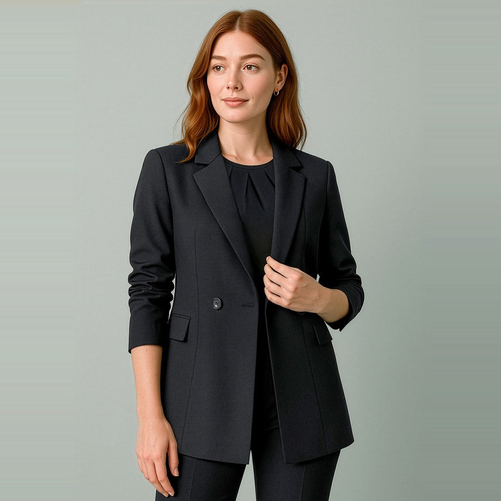 Biz Corporates Renew Womens Double Breasted Longline Jacket RJ400L in Pencil Black, worn by model