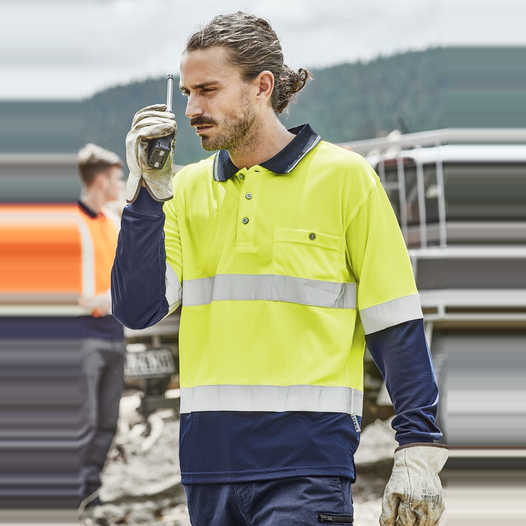 Syzmik Mens Hi Vis Spliced Long Sleeve Polo - Hoop Taped ZH235 in Yellow/Navy, worn by model