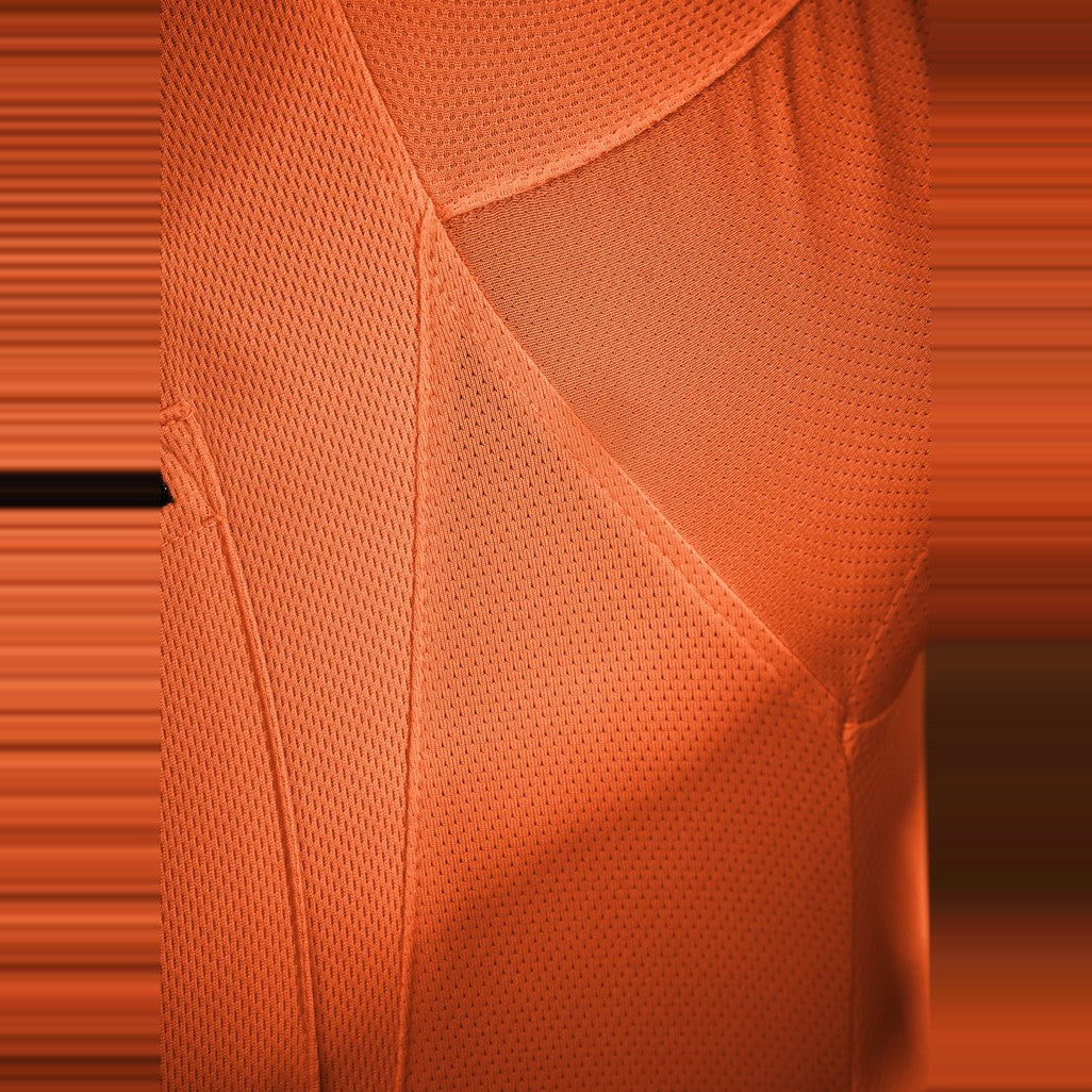 Syzmik Mens Hi Vis Flux Short Sleeve Polo ZH315 in Orange/Navy, worn by model, view 2