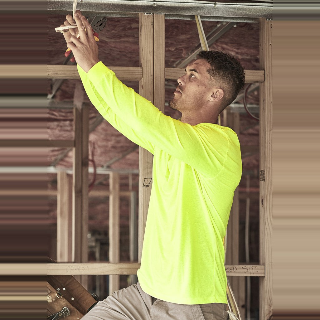 Syzmik Mens Hi Vis Long Sleeve Tee ZH390 in Yellow, worn by model
