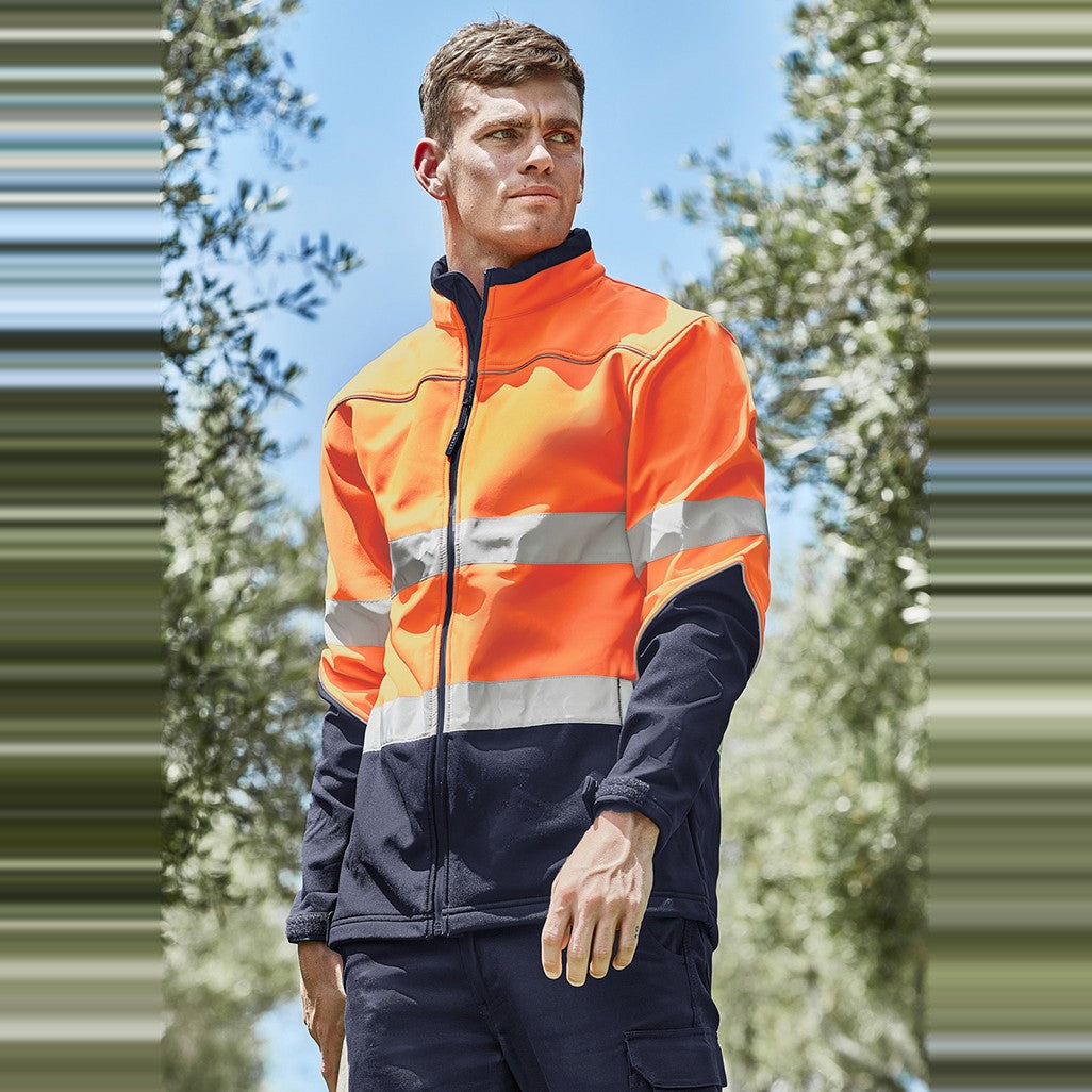 Syzmik Unisex Hi Vis Softshell Jacket ZJ353, worn by model