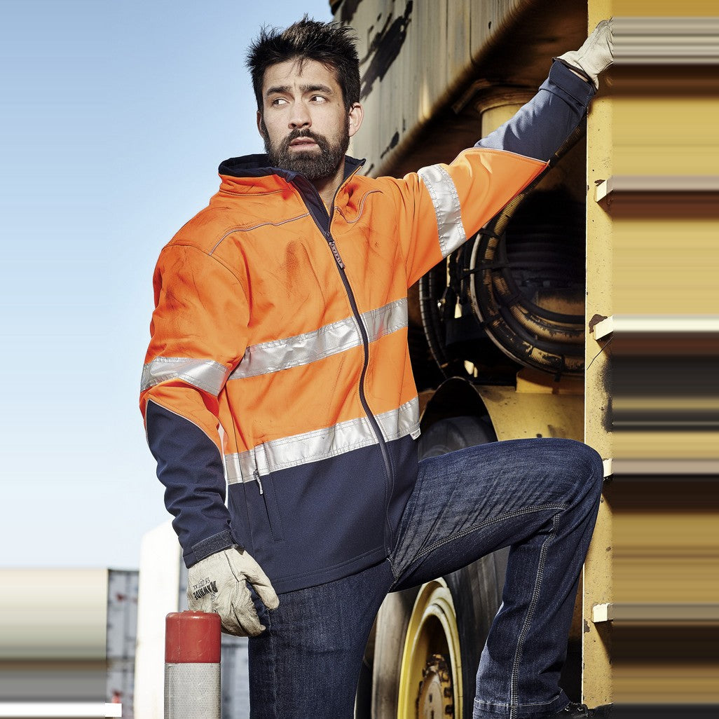 Syzmik Unisex Hi Vis Softshell Jacket ZJ353 in Orange/Navy, worn by model, view 2