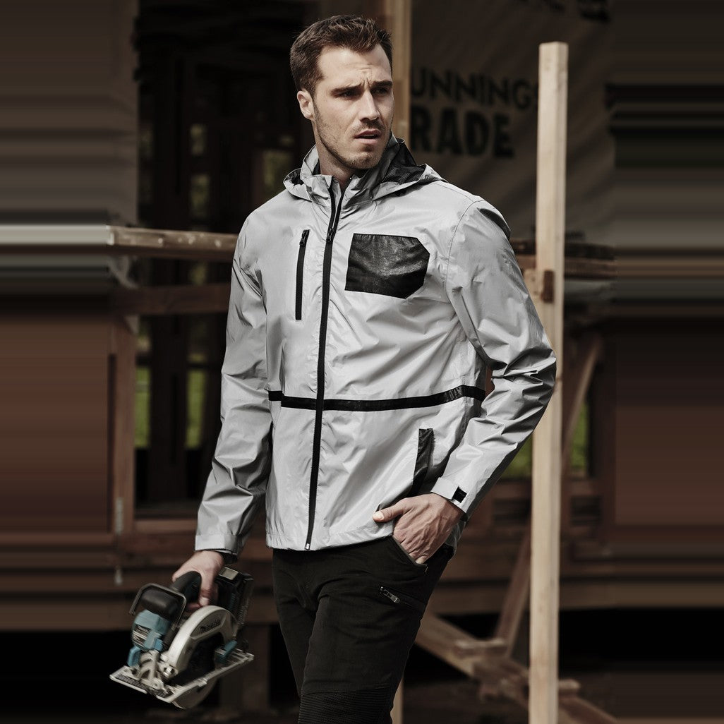 Syzmik Unisex Streetworx Reflective Waterproof Jacket ZJ380 in Reflective Silver, worn by model
