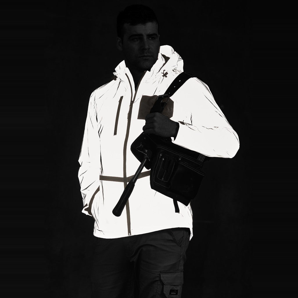 Syzmik Unisex Streetworx Reflective Waterproof Jacket ZJ380 in Reflective Silver, worn by model, view 5