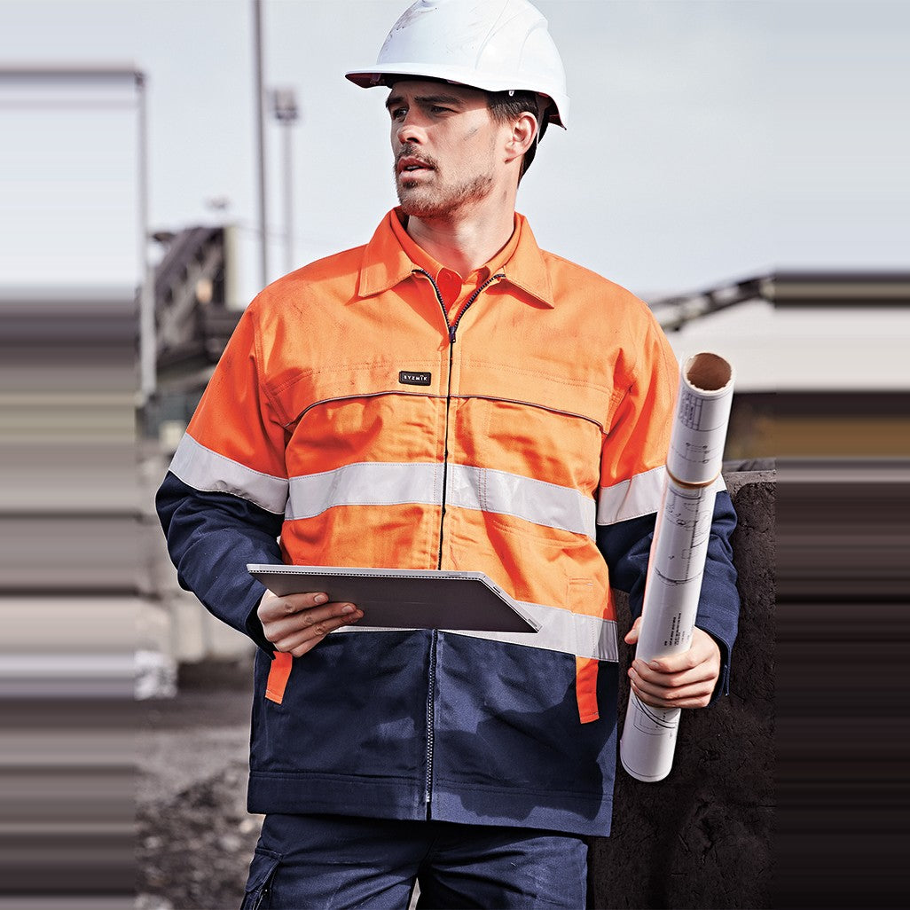 Syzmik Mens Hi Vis Cotton Drill Jacket ZJ590, worn by model