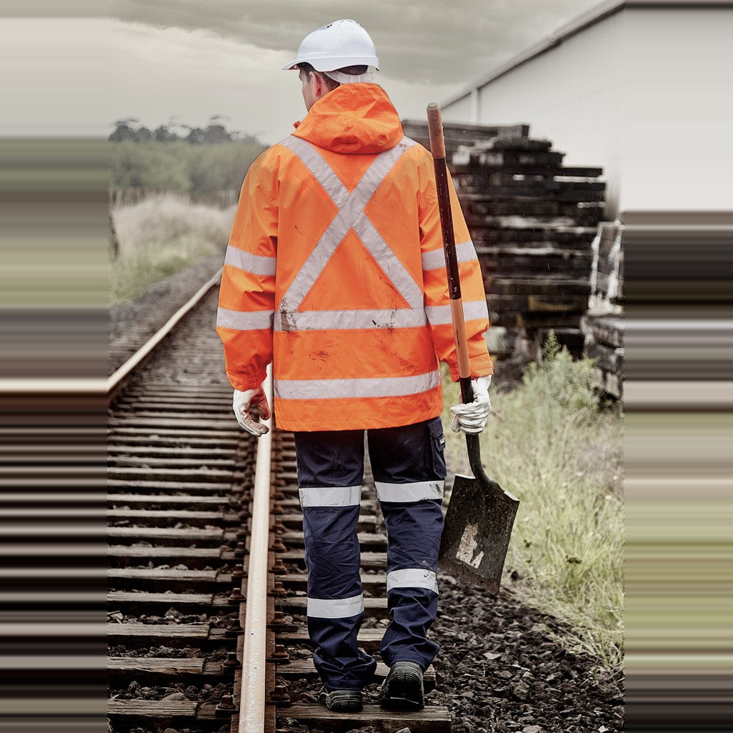 Syzmik Mens Hi Vis X Back Ultralite Waterproof Jacket ZJ657-AU in Orange, worn by model, view 2