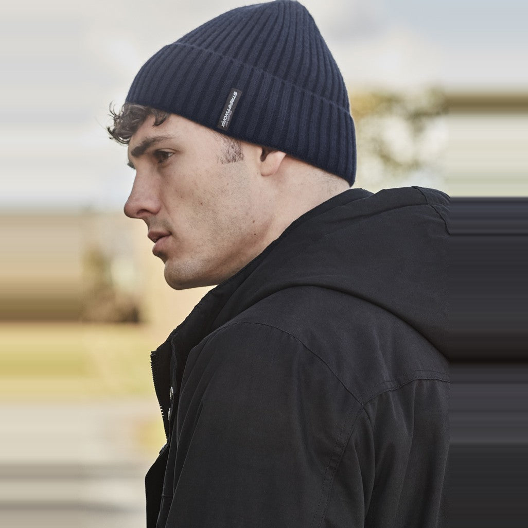 Syzmik Unisex Streetworx Beanie ZMBEAN in Navy, worn by model, view 2