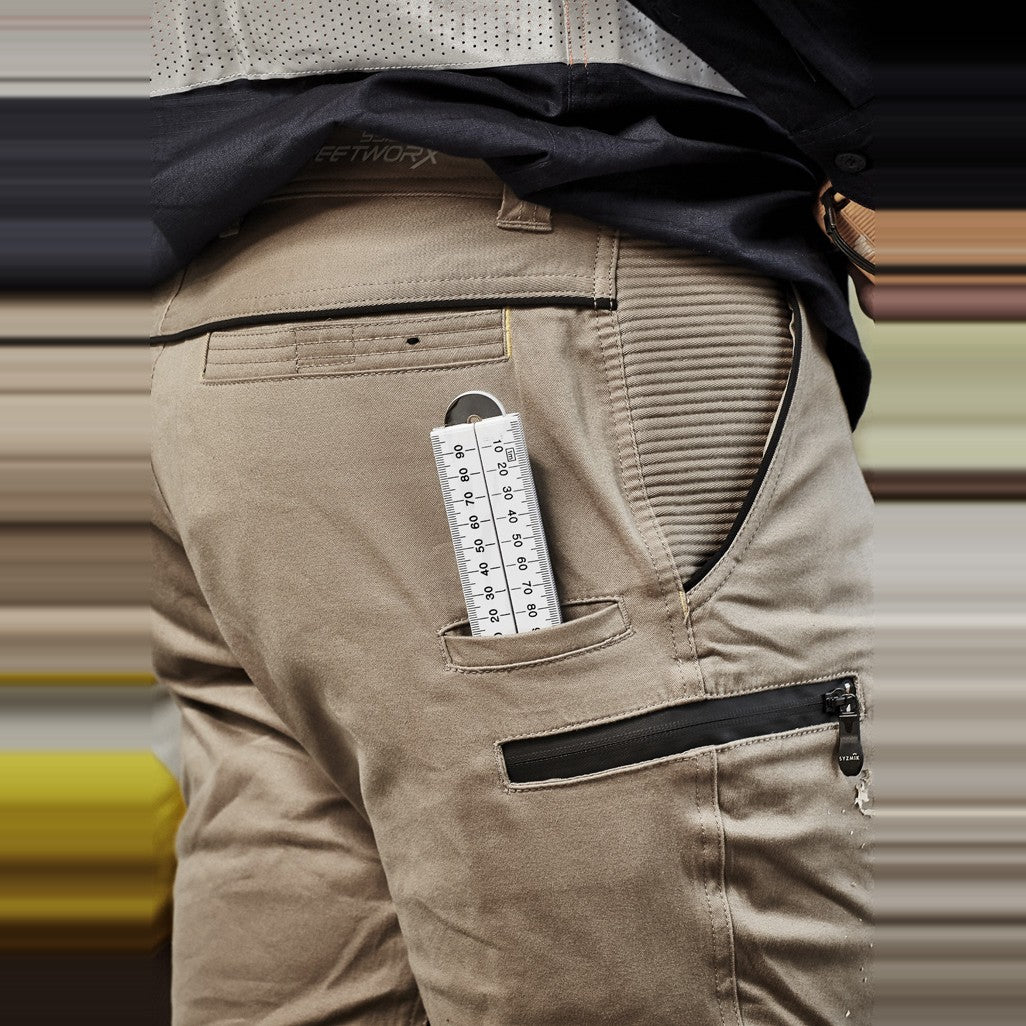 Syzmik Mens Streetworx Stretch Pant - Cuffed ZP340 in Khaki, worn by model, view 2