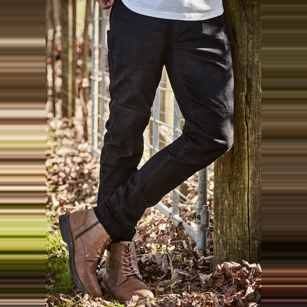 Syzmik Mens Streetworx Stretch Jean ZP540 in Black, worn by model, view 6