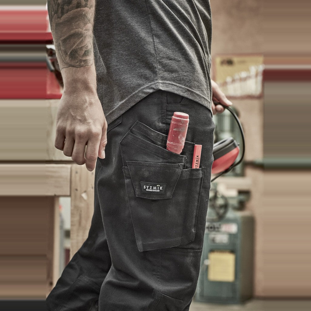 Syzmik Mens Rugged Cooling Stretch Pant ZP604 in Black, worn by model, view 2