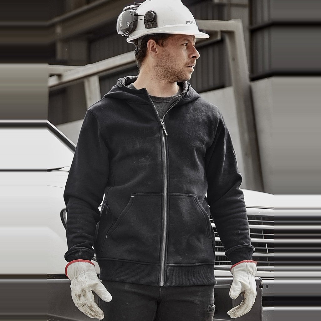 Syzmik Unisex Zip Front Multi-Pocket Hoodie ZT468 in Black/Charcoal, worn by model